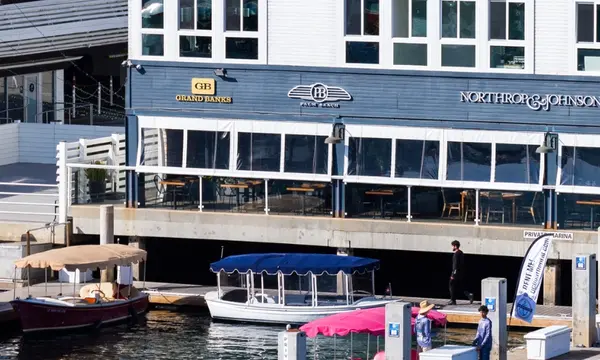 Grand Banks and Palm Beach Open Newport Beach Office