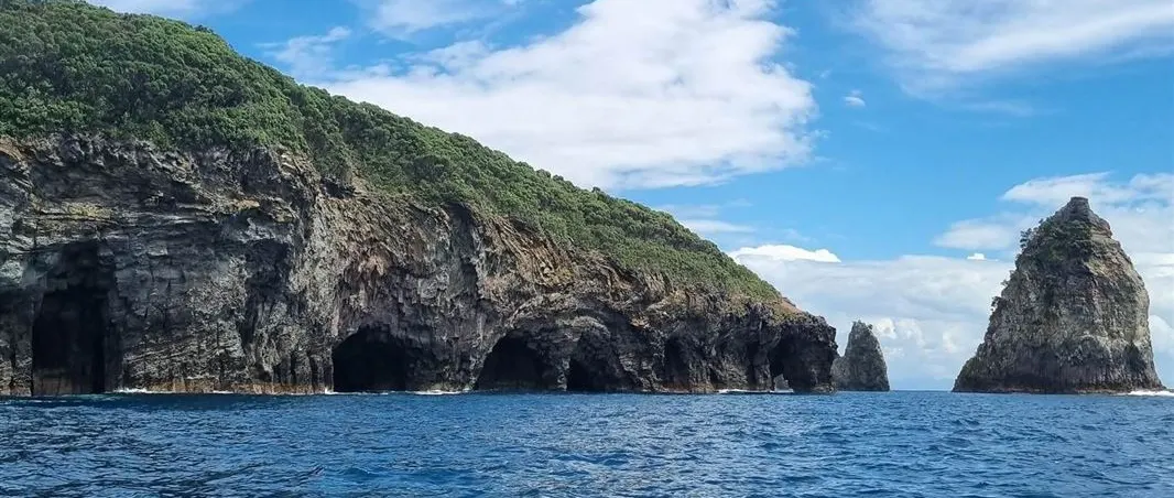 Tūhua by Yacht: Volcanic Shores and an Island Visit by Arrangement