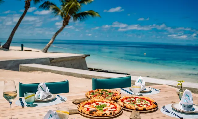 La Riva Extends Italian Riviera Dining Into Evenings on Desroches Island