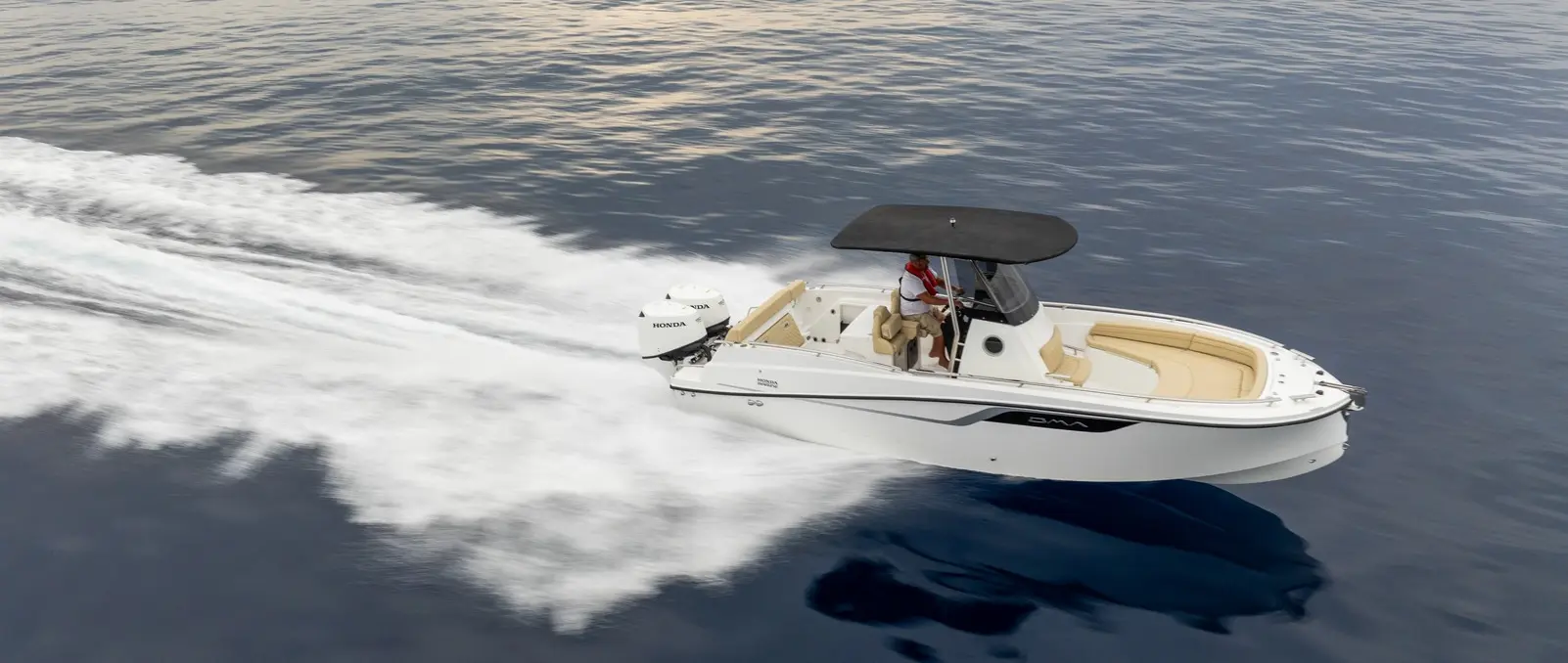 Official image supplied by Honda Marine — official photograph of a BMA 4XC centre-console boat fitted with Honda outboard, not the Barcelona stand.
