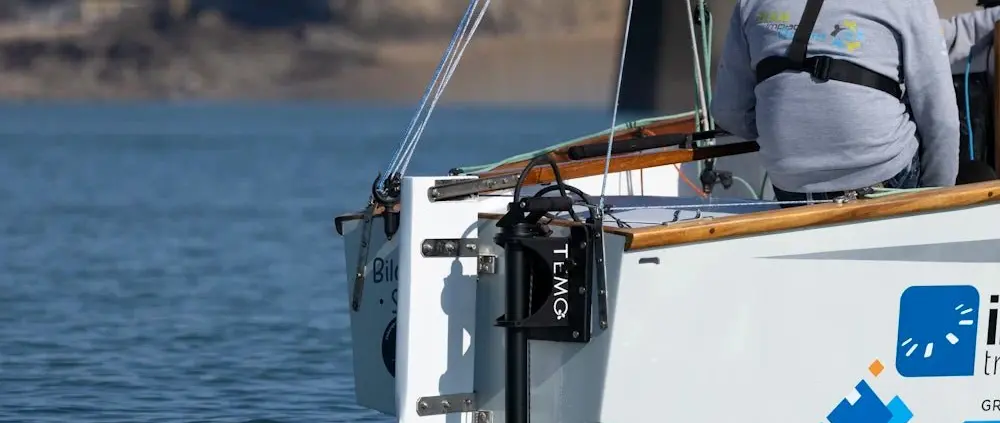 Official image supplied by TEMO — official photograph of OUTPOD electric propulsion installed on a sailing yacht under way.