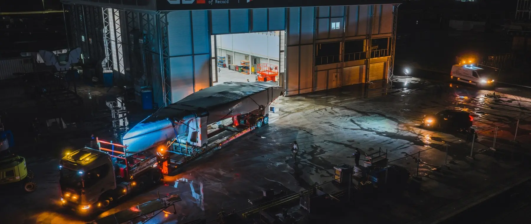 Official image supplied by GB1 British America's Cup Team — official photograph of RB4's arrival in Naples.