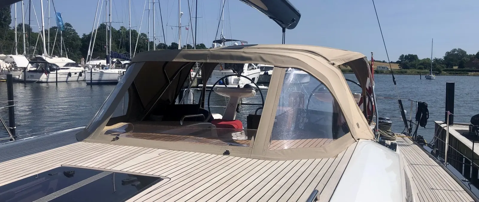 Official image supplied by Elite Yacht Covers — official Swan 48 sprayhood and bimini installation photograph from its Nautor Swan portfolio.