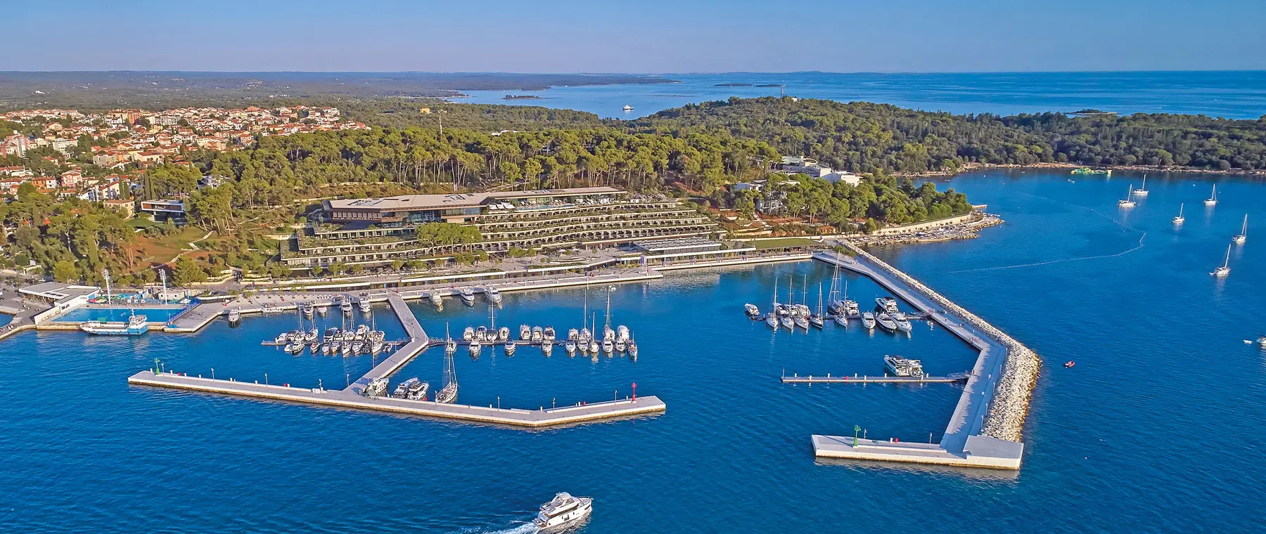 Official image supplied by ACI Marina Rovinj — aerial photograph of the established marina via Dockwalk.